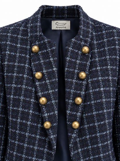 Giacca corta in tweed a quadri con bottoni dorati